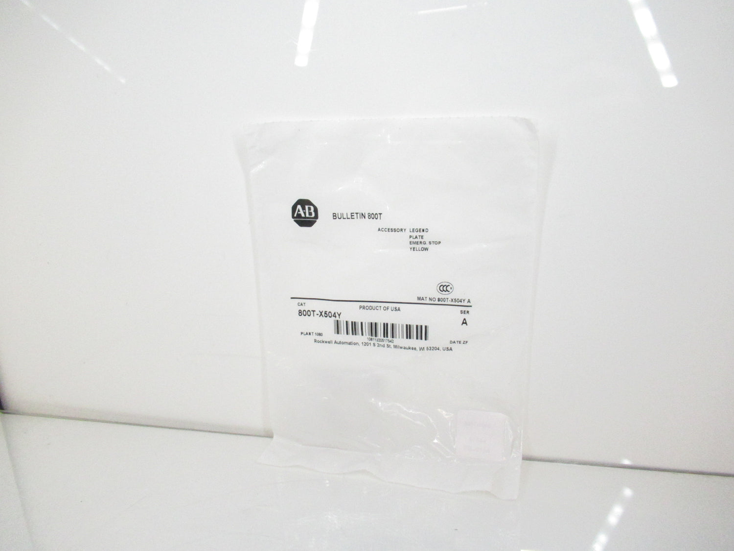Allen Bradley 800T-X504Y Standard Yellow Legend Plate, Emerg. Stop
